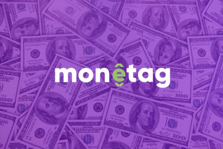 logo monetag trên nền dollar cash